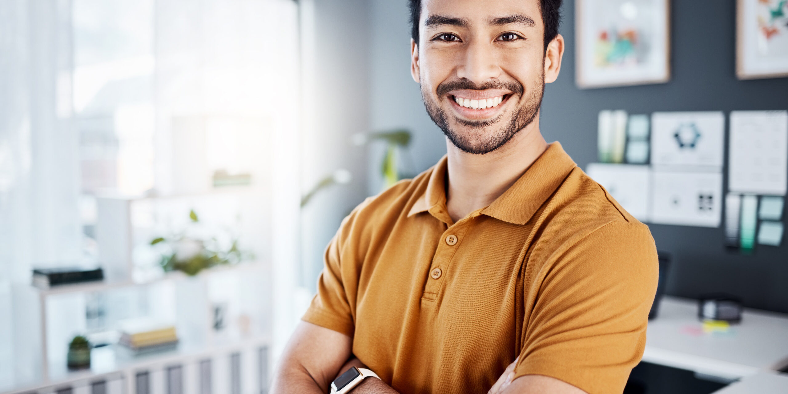 Portrait, crossed arms and happy business man, person or entrepreneur smiling for management, startup or mindset. Businessman, success and male agent with work happiness, mission or confidence.